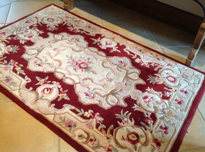 Floral rug, red and cream