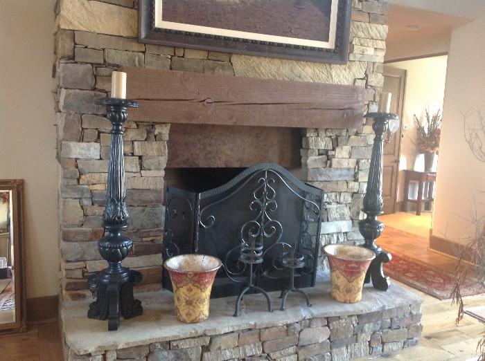 Pair of carved wood candleholders (fireplace screen is not included in sale)