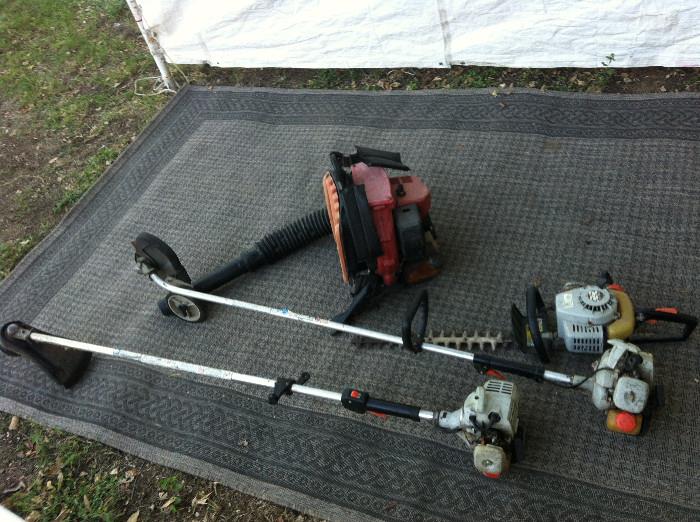 Yard tools, weed eater, edger, trimmer and a back pack leaf blower