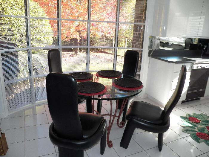 Really Cool -4 Leather chairs and  Round Glass top table with wrought iron legs