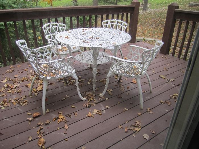 WROUGHT IRON TABLE AND CHAIRS
