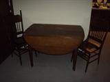 drop leaf table and oak chairs