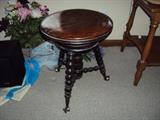 Claw and glass ball foot piano stool