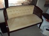 cane sided settee