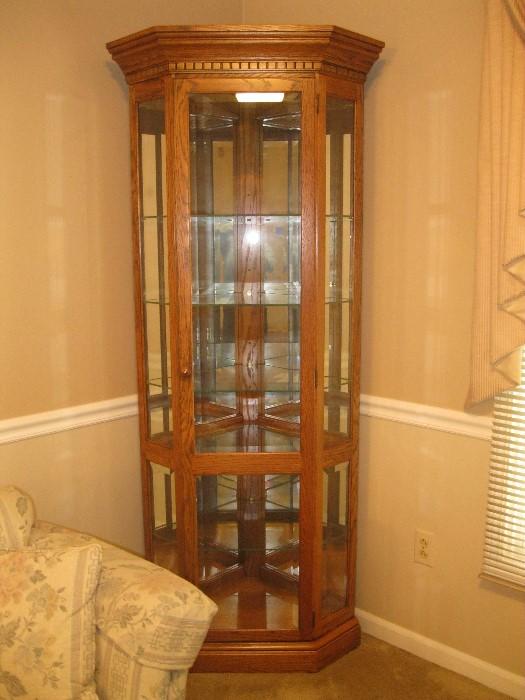 Corner curio cabinet - $125