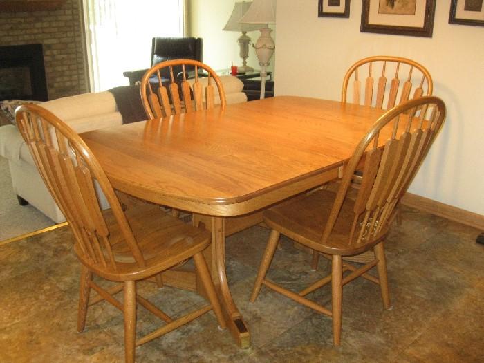Solid oak kitchen table with four chairs - $150