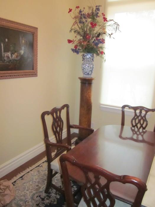 Grey Still life.  Pillar, floral arraingment.  Kaplan-Baker dining table & chairs.