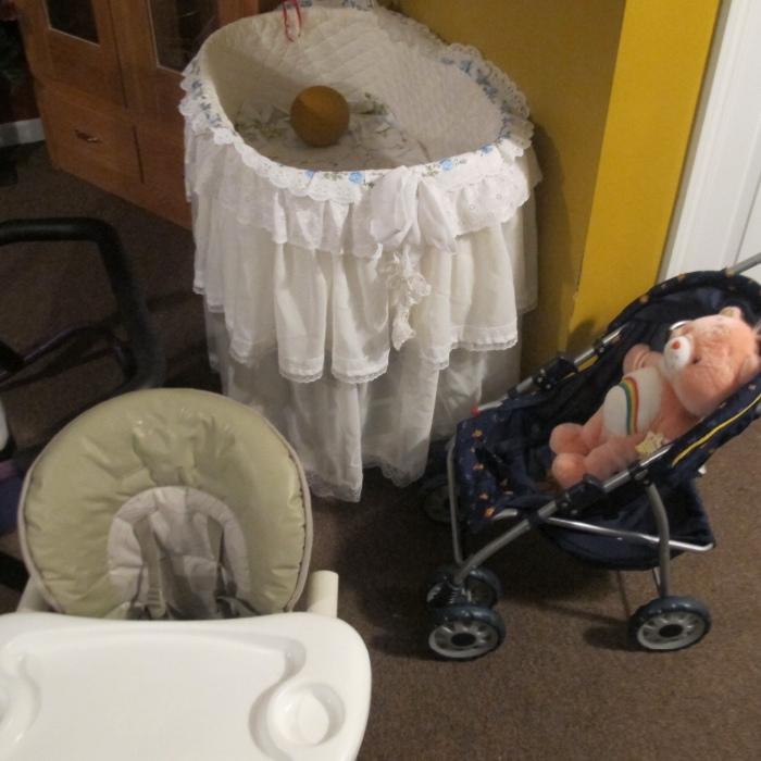 PART OF A LARGE COLLECTION OF GRANDMOTHERS NEARLY NEW ITEMS this is a bassinet , high chair, and stroller