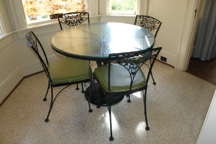 Metal and glass table with 4 chairs