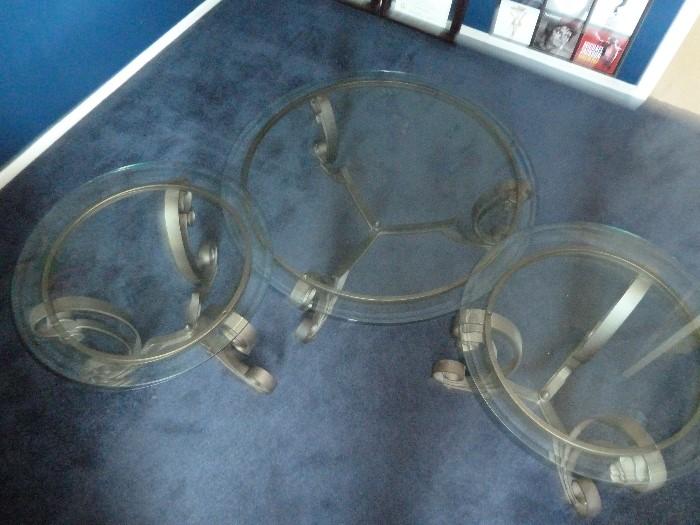 3 glass cocktail tables (one large, 2 smaller).