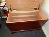 Nice clean cedar chest.  Left hinge is loose.