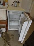 Dorm size GE refrigerator.