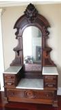 Vintage Eastlake style dresser/vanity with full mirror, marble tops and plenty of storage area. Size: 92"H x 50 1/2"W x 21"D. Condition: Very Good for age. 