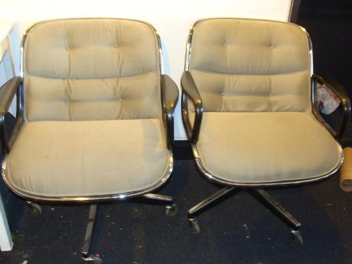 1976 Charles Pollock Chairs:
Two 1976 Charles Pollock chairs from Knolls Furniture. Metal frame with hard black plastic backing on casters. Fabric is a Vinyl like that can easily be cleaned.
Measure: 31" H x 24" W x 17" Seat, back of seat is also 17" H. Condition: Good