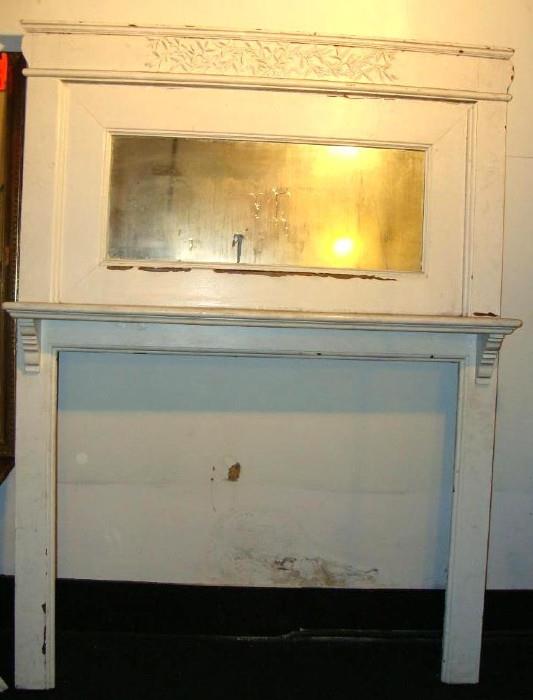 Vintage Wood Mantel:
Beautiful Mirrored Mantel piece with applied floral details, It has been repainted and measures approx. 7' H x 5'1.5" W and 11" Deep . This Mantelpiece Was removed from a home in German Village
Condition: Good