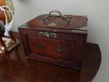 Mahjong set in Asian redwood box, among the numerous items of interest purchased on voyages through East Asia.