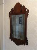 Period wall mirror in mahogany frame.