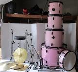 Drum Set
Christmas is coming.....  This pink drum set would make a great gift.  2 tom toms - 12" and 13" (with brackets) and holders.
Snare drum - 14" and stand.
Kettle drum - 16".
Bass drum with foot pedal - 22" - 5 bass drum legs (the top does need to be cleaned).
2 stand alone cymbals and stands - 14" and 18" (1 is banged up but still works - see more pics).
1 set of hi hat cymbals, stand and pedal - 11.5"
Padded seat.
Also includes a set of acrylic drum sticks marked Disneyland that light up, but one is broke - see more pics.
I could not find a brand name anywhere.
Condition: very good