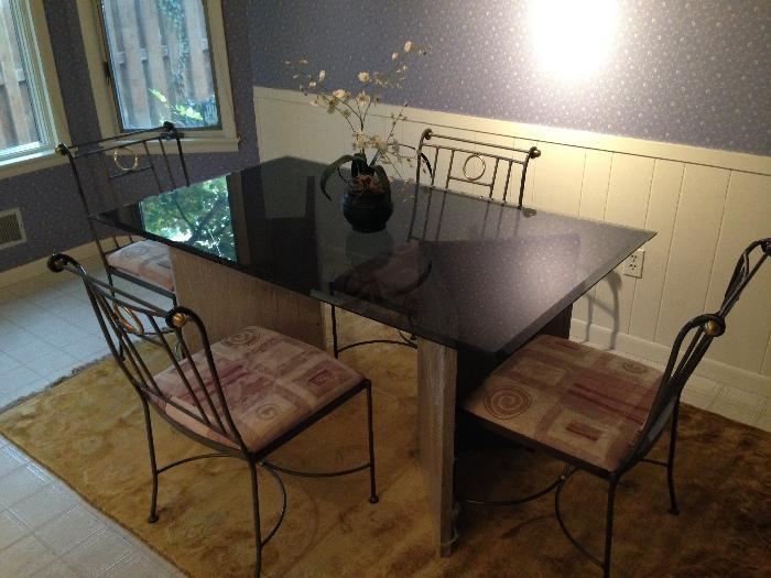 Glass top kitchen table with 4 chairs (4'11"x2'11") - $250 or best offer.
