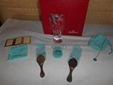 Great Rom-"Smalls Area:"  Various sterling items including a small TIFFANY sterling triple fold photo set; two TIFFANY small vintage sterling hand mirrors; TIFFANY sterling starfish earrings (posts); sterling "A" necklace (not TIFFANY); and a BACCARAT 6 inch crystal angel with box.