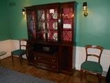 Dining Room:  It's a little dark but the top drawer is now pulled down to show that it is indeed a secretary as well.