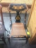 Black Wooden Uniquely Painted Chair with Wicker Bottom