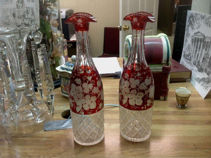 1029 - Matched pair of ruby crystal botles in mint condition, 12 in. T.
