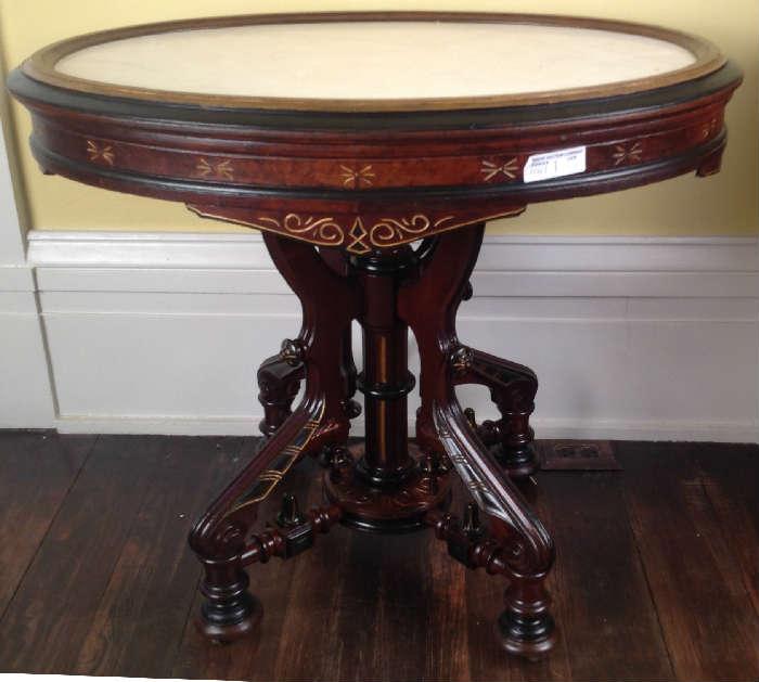 1141 - Ornate Victorian walnut oval center table with insert marble and gold and black highlights, 30IN T, 34IN W, 25IN D