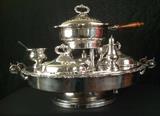 1137 - Silver-plate lazy Susan with warmers and all accessories, excellent condition, 18IN T, 24IN D