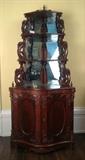 1142- Rosewood carved corner etagere with excellent polished finish, att to Alexander Roux, 70IN T, 31IN W, 22IN D