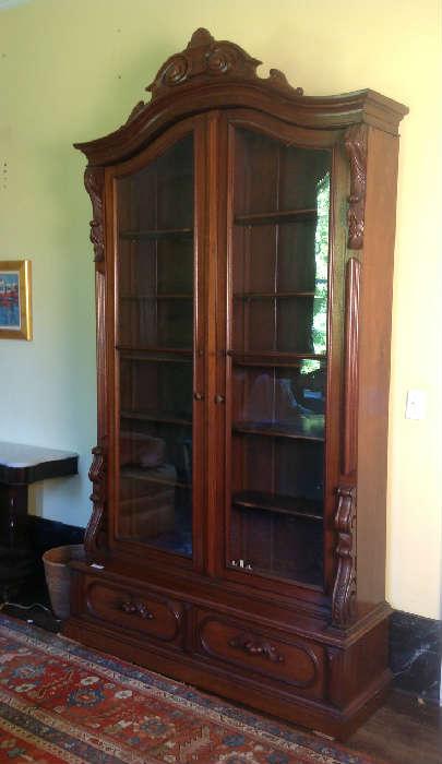 1146- Walnut Victorian bookcase with Napoleon top and excellent carving, 8FT10IN T, 58IN W, 18IN D