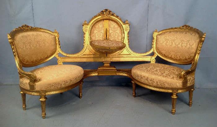 2018 - Gold gilded Victorian conversation sofa with let down tray, 37 in. T, 69 in. W, 25 in. D, ca. 1870.