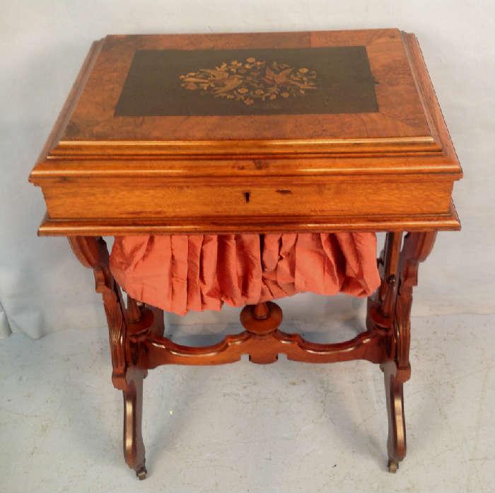 2022 - Walnut Victorian sewing stand with decorative top, 30 in. T, 22 in. W, 16 in. D.