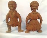 2037 - Pair of cast iron mammie and porter  andirons, 16 in. T.