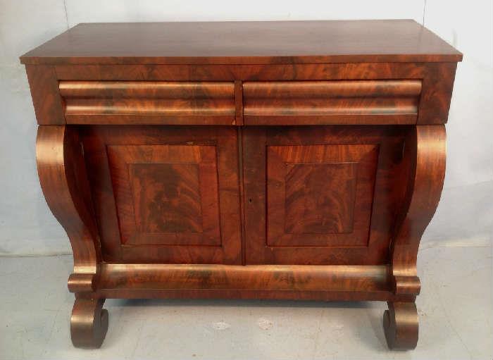 2021 - Flame mahogany server with scroll front, has two drawers and two doors, 41 in. T, 48 in. W, 24 in. D.