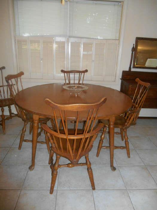 Hard Rock Maple Table w 6 Chairs. Has 2 leaves and pad for top..
