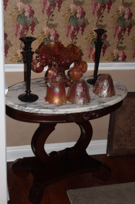 Marble Top Table, Candlesticks and Decorative Objects.