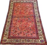 Lot#3015, MALAYER IRANIAN HAND WOVEN RUG, W 4' 3" L 6' 4"Decorated in all over bird in nest and floral motif on a salmon colored ground, with a surrounding floral border. Measuring L. 6 ft. 4 x 4 ft. 3.