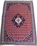 Lot#3019, SENNEH KURDISH HAND WOVEN RUG, C. 1900, W 3' 7" L 5' 2"Northwest Iran. Having a central floral decorated medallion on a pinkish red ground. Measuring L. 5 ft. 2 x 3 ft. 7. Circa 1900.