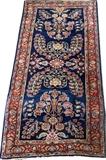 Lot#3034,SAROUK PERSIAN HAND WOVEN RUG, C. 1930, W 2' 7" L 4' 11"Decorated with a scrolling foliate and floral motif on a blue ground, measuring L. 4 ft. 11 x 2 ft. 7. Circa 1930.