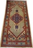 Lot#3088, SARAB HAND WOVEN CARPET, C. 1900, W 2' 11" L 6' 1"SARAB HAND WOVEN CARPET, C. 1900, W 2' 11" L 6' 1"Having a floral decorated central medallion, with surrounding geometric designs, all on a tan ground. Measuring L. 6 ft. 1 x 2 ft. 11, circa 1900.