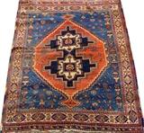 Lot#3096, AFSHAR SOUTH CENTRAL IRAN HAND WOVEN RUG, C. 1900, W 3' 3" L 3' 8"Featuring a center double form medallion on an orange ground. Measuring L. 3 ft. 8 x 3 ft. 3. Circa 1900.