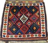 Lot#3106, JAF KURD NORTHWEST IRAN HAND WOVEN BAG FACE, C. 1900, W 2' 5" L 2' 6".Decorated with repetitious diamond pattern in blue, red, and yellow. Measuring L. 2 ft. 6 x 2 ft. 5. Circa 1900.