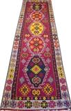 Lot#3153, TURKISH KILIM FLAT WOVEN RUNNER, C. 1900, W 3' 3" L 10'Featuring five center medallions on a red ground, decorated with an all over geometric design. Measuring L. 10 ft. x 3 ft. 3. Circa 1900.