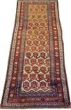 Lot#3157, KURDISH NORTHWEST IRAN HAND WOVEN RUNNER, C. 1900, W 3' 5" L 9'.Decorated with a repetitious stylized design on an pale yellow ground, with surrounding blue, red, and ivory borders. Measuring L. 9 ft x 3 ft. 5. Circa 1900.
