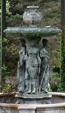 Lot#4, CARVED STONE 'FOUR SEASONS' GARDEN FOUNTAIN, H 7' DIA 48"Having semi-nude female figures representing the four seasons standing about the base, measuring H. 7 ft., with the bowl having a 48" diameter.
