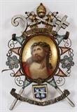 Lot#23, ITALIAN MICRO-MOSAIC FRAMED PORCELAIN PORTRAIT, ANTIQUE, H 6", W 4"Hand painted porcelain portrait of Jesus with crown of thorns, framed in a micro-mosaic easel style frame. Measuring H. 6" x 4". 19th Century.