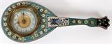 Lot#27, ITALIAN MICRO MOSAIC MANDOLIN FORM BOUDOIR CLOCK, L 8"Mandolin form clock, framed in micro mosaic decoration, with a floral motif on a blue and white ground. Measuring L. 8".