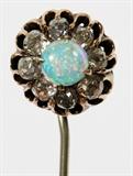 Lot#131, ANTIQUE BLACK OPAL & 1.00CT DIAMOND HAT PIN, L 2 5/8"14kt gold and silver lady's hat pin, featuring a black opal prong set at the center, surrounded by 1.00 carat of round diamonds, measuring L. 2 5/8", with a total approximate weight of 5.1 grams.