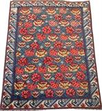 Lot#3123SEJSHORE CAUCASIAN KUBA HAND WOVEN RUG, C. 1890, W 3' 1" L 4'Having a floral and foliate motif on a blue ground. Measuring L. 4 ft. x 3 ft. 1. Circa 1890.